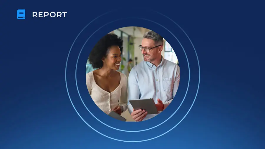 A man and woman smile while looking at a tablet, set against a dark blue background with concentric circles. 