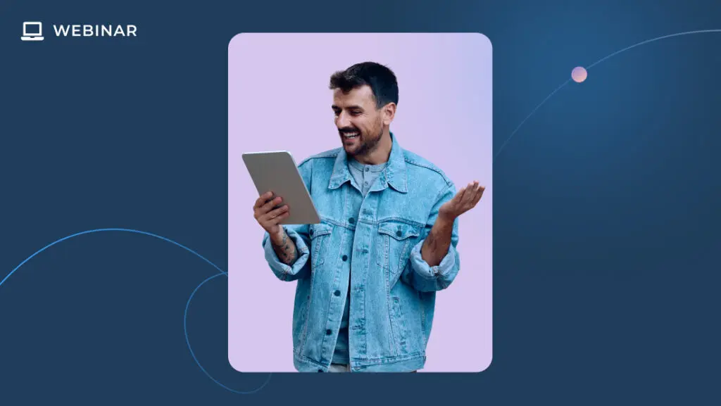 A man with a beard, wearing a denim jacket, holds a tablet and gestures with a smile. Framed by a graphic design with curved lines, the word 