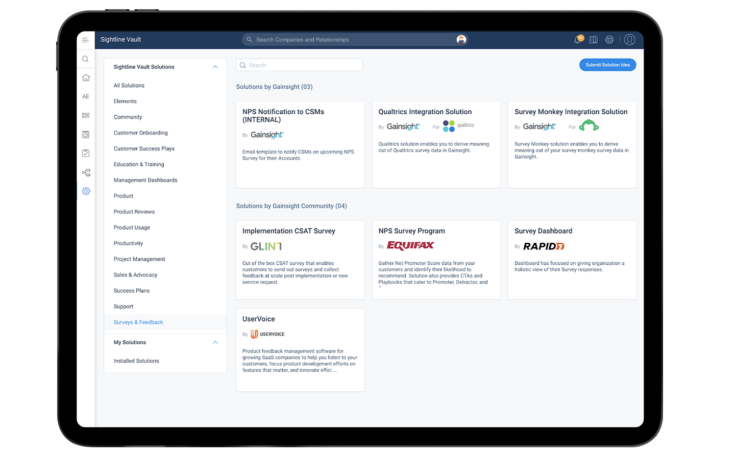 Screenshot of the Gainsight customer success platform on a tablet, displaying a menu and various solutions like NPS Notification, Qualtrics Integration, and UserVoice. The intuitive interface features navigation options on the left and detailed solution insights on the right.